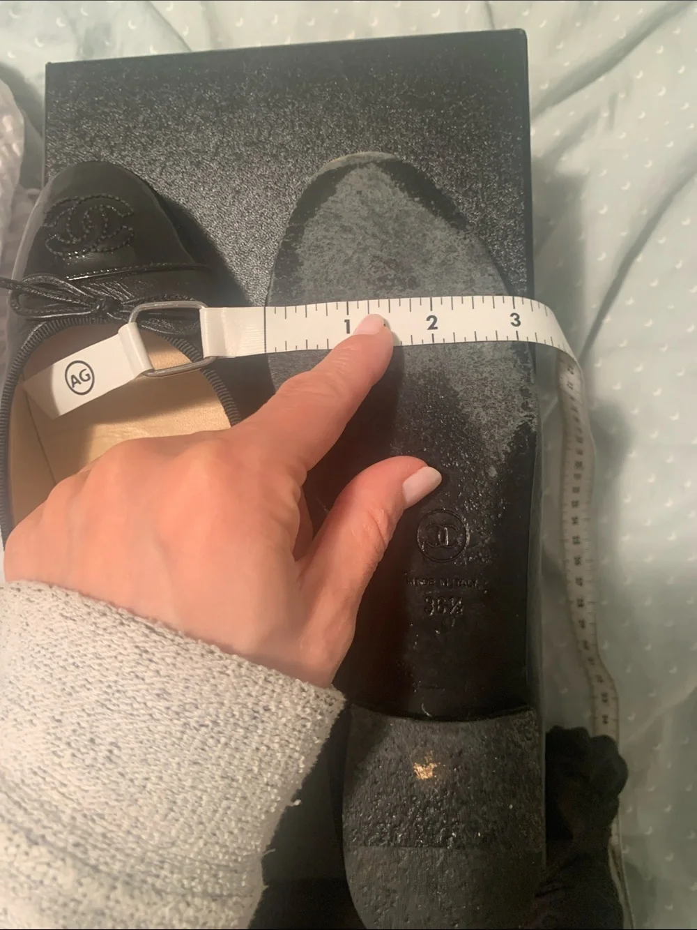 CHANEL Black Leather Cap-Toe CC Ballet Flats